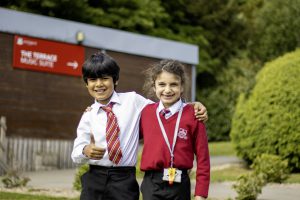 Two Prep pupils posing for the camera outside